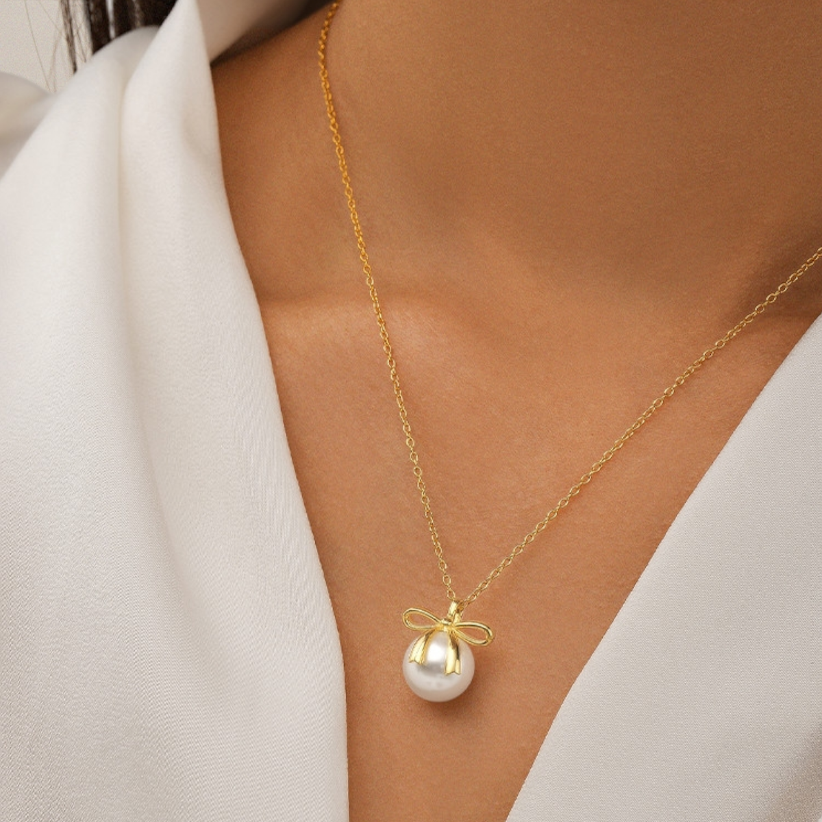 Golden Bow Pearl Necklace